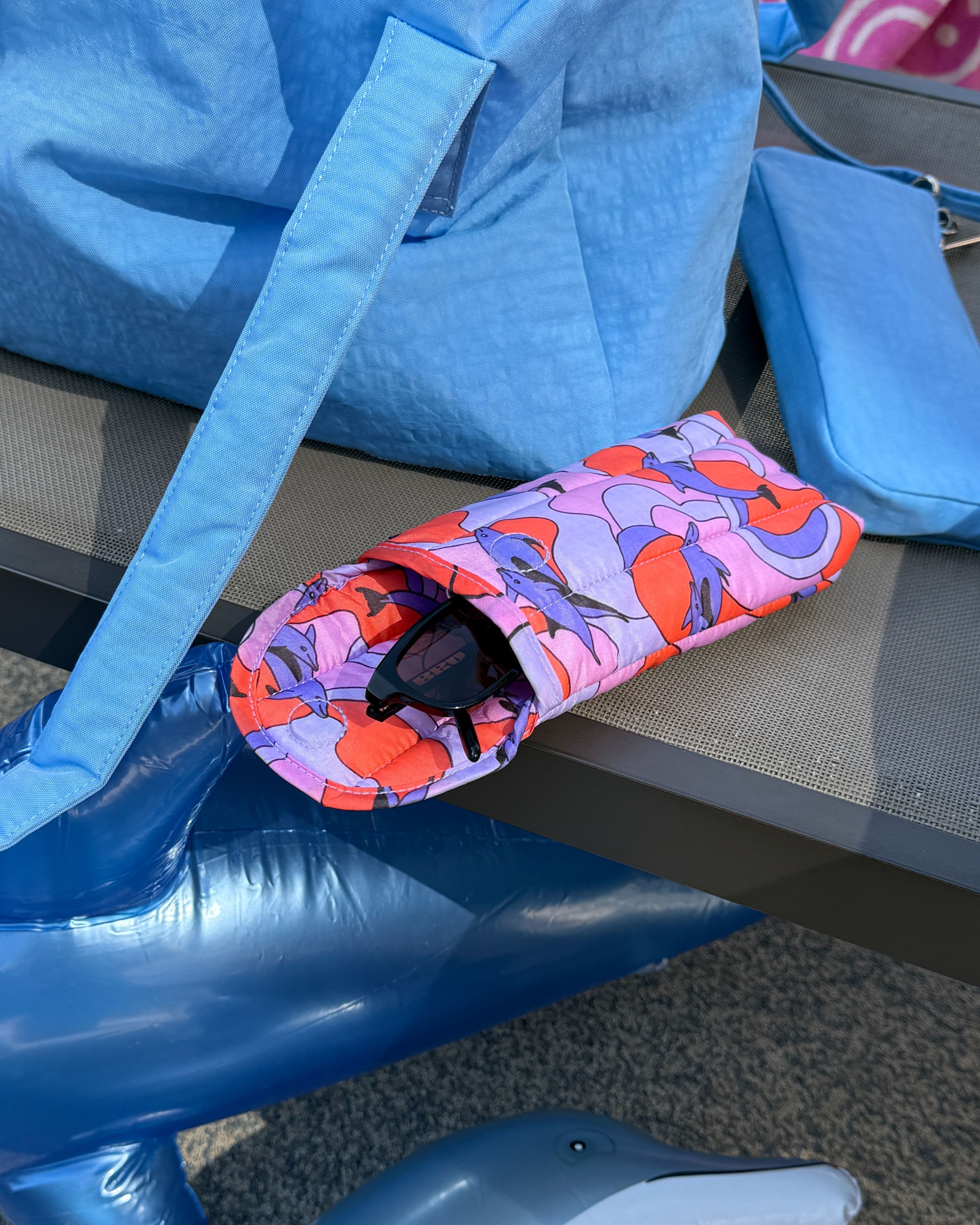 Puffy Glasses Sleeve in Dolphins